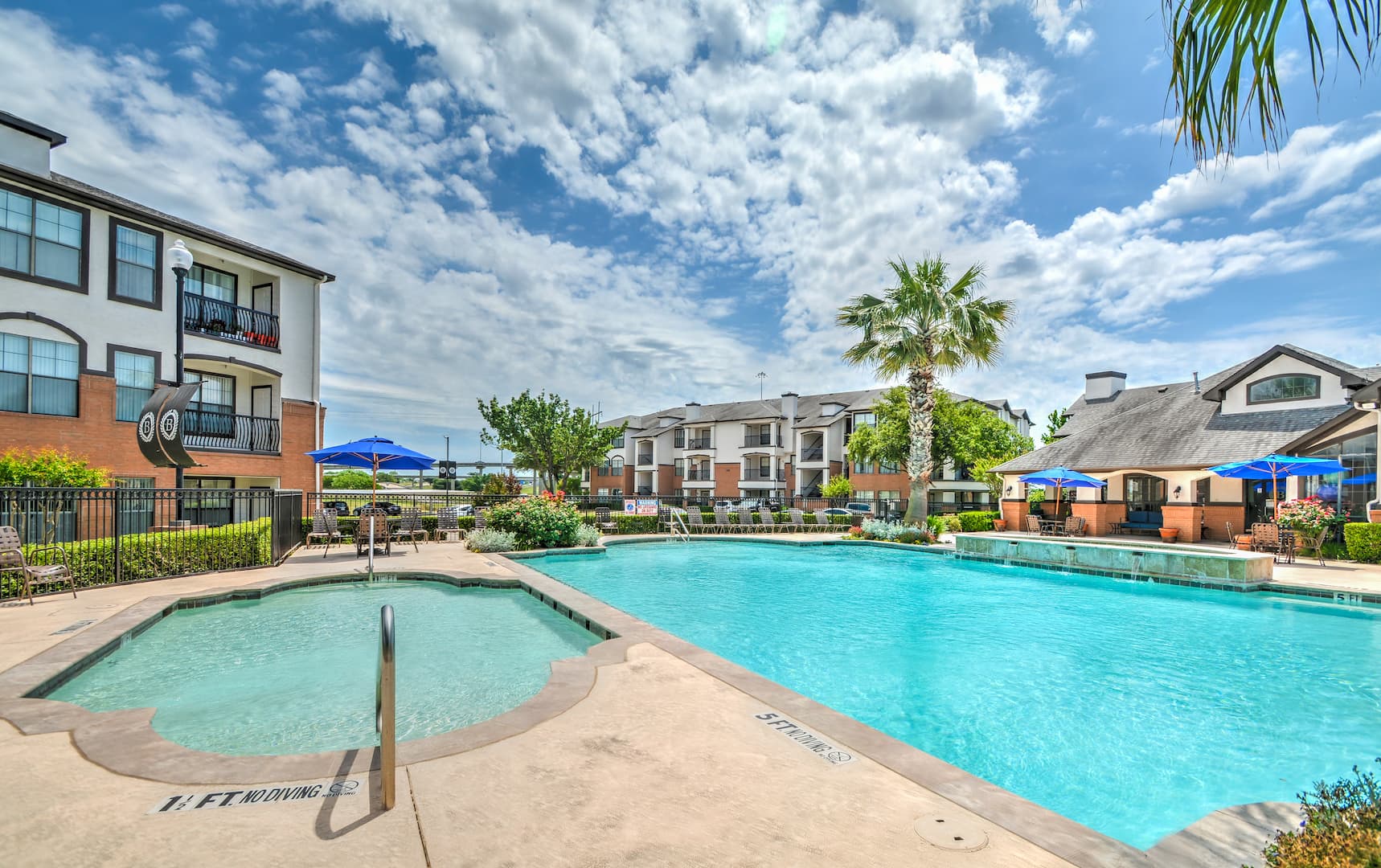 poolside view to apartment buildings