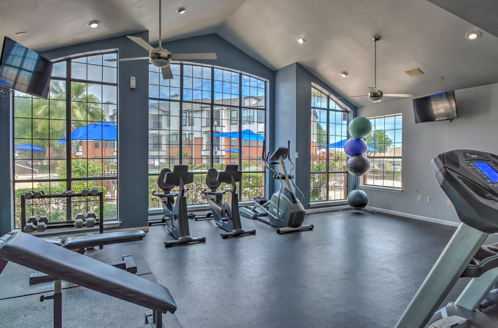 fitness center with modern exercise machines and equipment