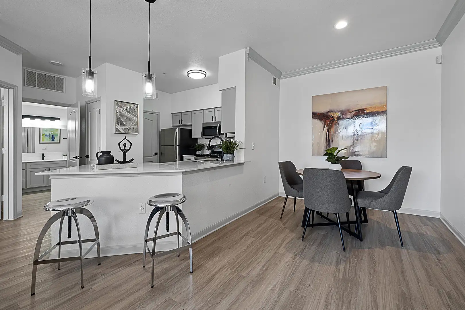 looking towards dining room and kitchen breakfast bar